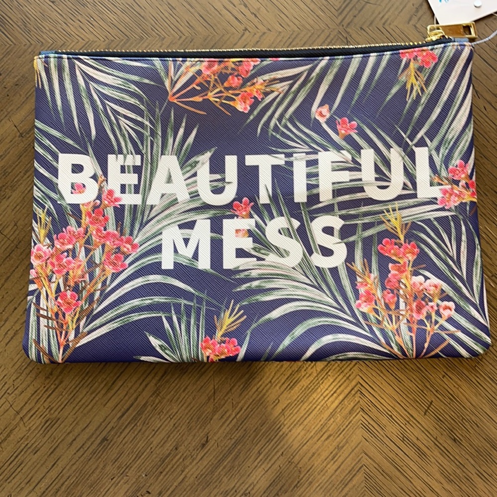 NWT:  Zippered makeup pouch.